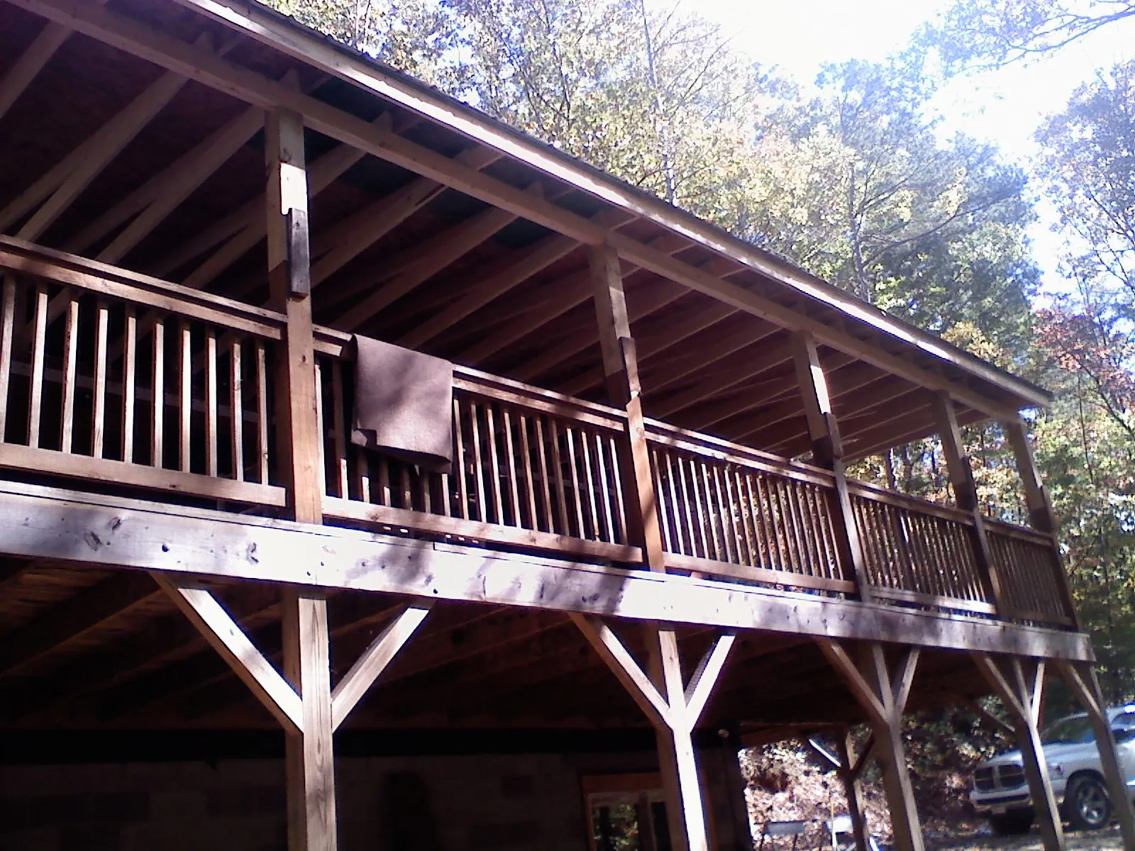Timber framing under a new elevated porch and deck — Roof Leak Repair in Turtle Creek by Roofing Brothers